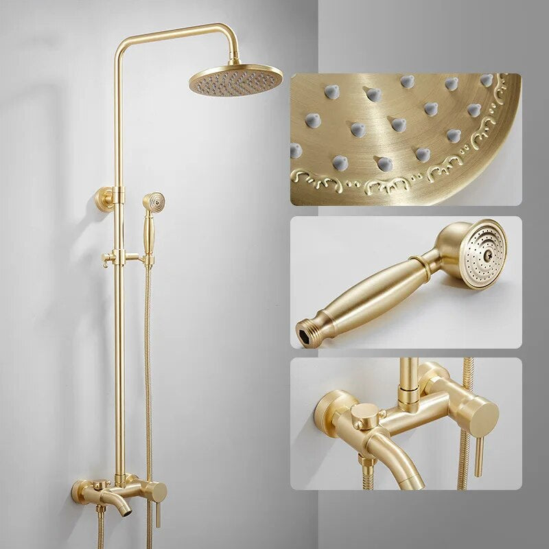 The Tiqui Maison Exposed Pipe Shower System features a gold-colored solid brass build with a round overhead air injection showerhead, handheld showerhead, and control valves. Insets highlight the showerhead, handheld piece, and faucet details on gray background.