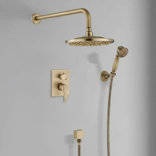 The Heritage Antique Brass Shower System by Morsale.com features a large overhead rainfall shower head, a handheld shower with hose, and a square lever control panel, all set against a light gray wall for a modern look.
