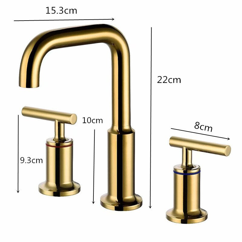 The Tiqui Double Handle Deck Mounted Bathroom Faucet is solid brass, features gold finish, stands 22cm tall by 15.3cm wide, and includes labeled handles measuring 9.3x10cm (left) and 8x8cm (right).
