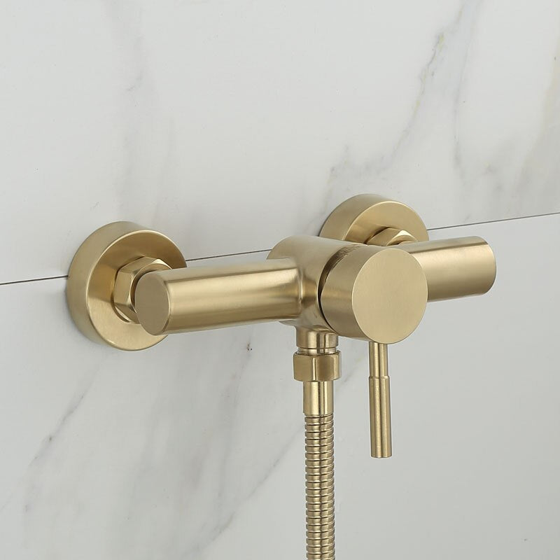 The AllFixture Wall Mounted Shower Faucet With Handheld features a modern brushed gold cylindrical design, single lever handle, and flexible hose, creating a sleek accent against a white marble wall.