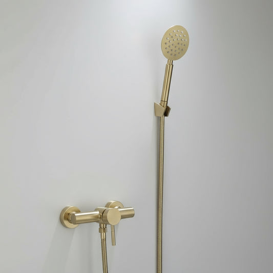 The AllFixture Windsor Wall Mounted Shower Faucet is a gold brushed solid brass system with a handheld showerhead and hose, wall-mounted on a white surface beside minimalist matching controls.