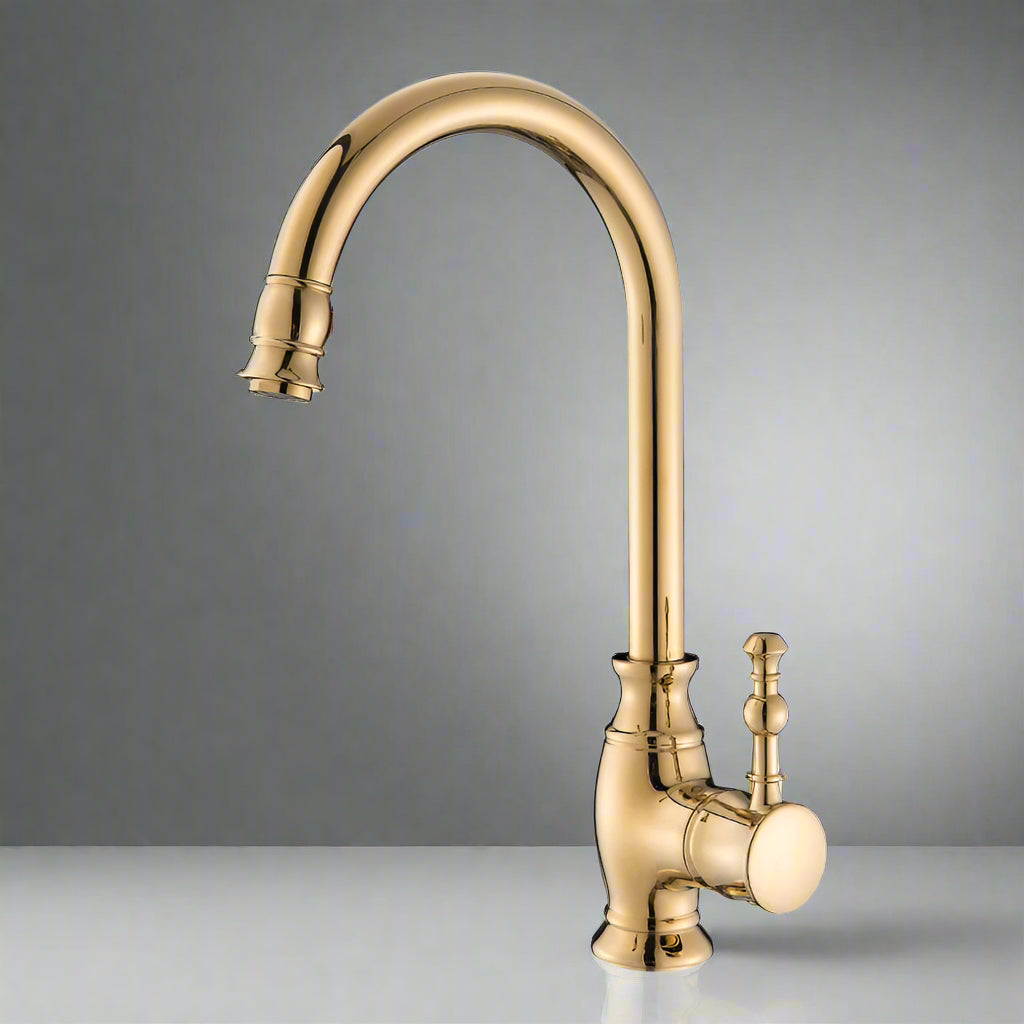 The Tiqui Polished Gold Single Handle Kitchen Faucet, featuring a high curved spout and side lever handle, rests on a reflective surface against a plain gray background, showcasing the elegance of modern kitchen fixtures.