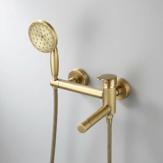 The Tiqui Maison Bathtub Faucet With Shower Head features a modern gold finish, wall-mounted design, single lever handle, horizontal spout, handheld showerhead with flexible hose—set against a plain light gray background. Ideal as an antique brass accent.