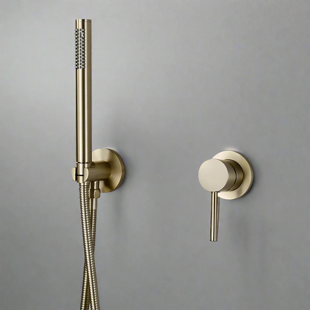 The Morsale.com Wall-Mounted Handheld Shower features a modern brushed gold finish, solid brass construction, matching round wall mount, and single lever control—shown here against a smooth light gray wall.