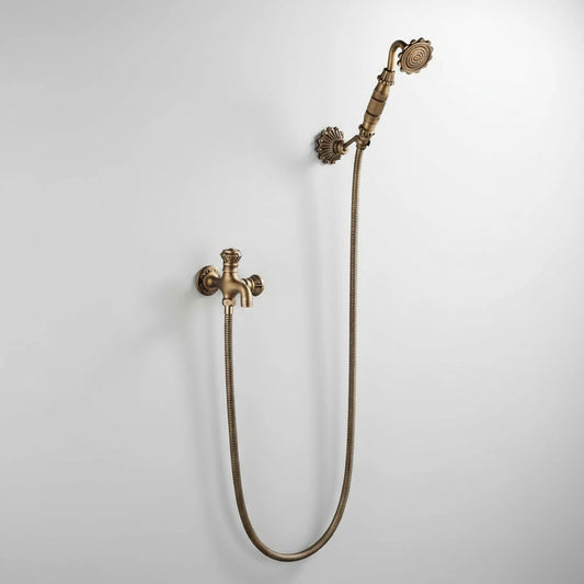 An ornate, vintage-style brass handheld showerhead is paired with the Allfixture Heritage Wall-Mounted Bidet Faucet, featuring a flexible hose connecting the showerhead to the wall-mounted water control valve.