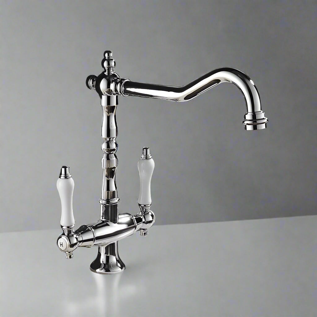 The ELLEN Antique Brass Dual-Handle Kitchen Faucet features two handles and a curved 360° swivel spout, mounted on a smooth white surface with a plain gray background.
