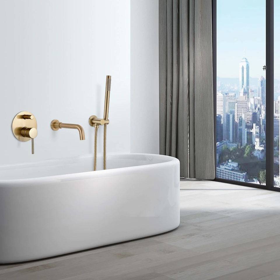 A modern bathroom wall showcases the Tiqui Wasser™ Solid Brass Bathtub Faucet With Handheld Shower. It includes a round control valve with a lever handle, a curved faucet spout, and a handheld shower head connected by a flexible hose. The light grey wall complements the sleek design, and the tub edge is visible.