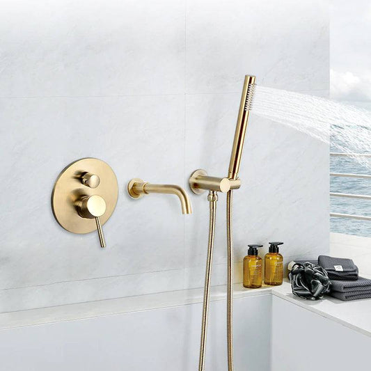 A modern bathroom wall showcases the Tiqui Wasser™ Solid Brass Bathtub Faucet With Handheld Shower. It includes a round control valve with a lever handle, a curved faucet spout, and a handheld shower head connected by a flexible hose. The light grey wall complements the sleek design, and the tub edge is visible.