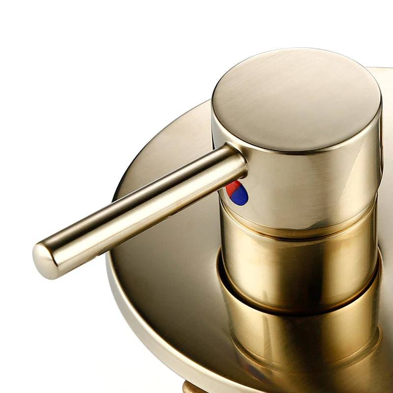 A modern bathroom wall showcases the Tiqui Wasser™ Solid Brass Bathtub Faucet With Handheld Shower. It includes a round control valve with a lever handle, a curved faucet spout, and a handheld shower head connected by a flexible hose. The light grey wall complements the sleek design, and the tub edge is visible.