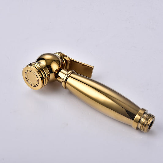 An AllFixture Wall-Mounted Handheld Bathroom Toilet Bidet Faucet Sprayer in a polished gold finish is elegantly installed on a light grey marble wall. It exudes the sophistication of a luxurious bathroom sink faucet with its ergonomic design, smooth finish, and flexible metal hose attachment.