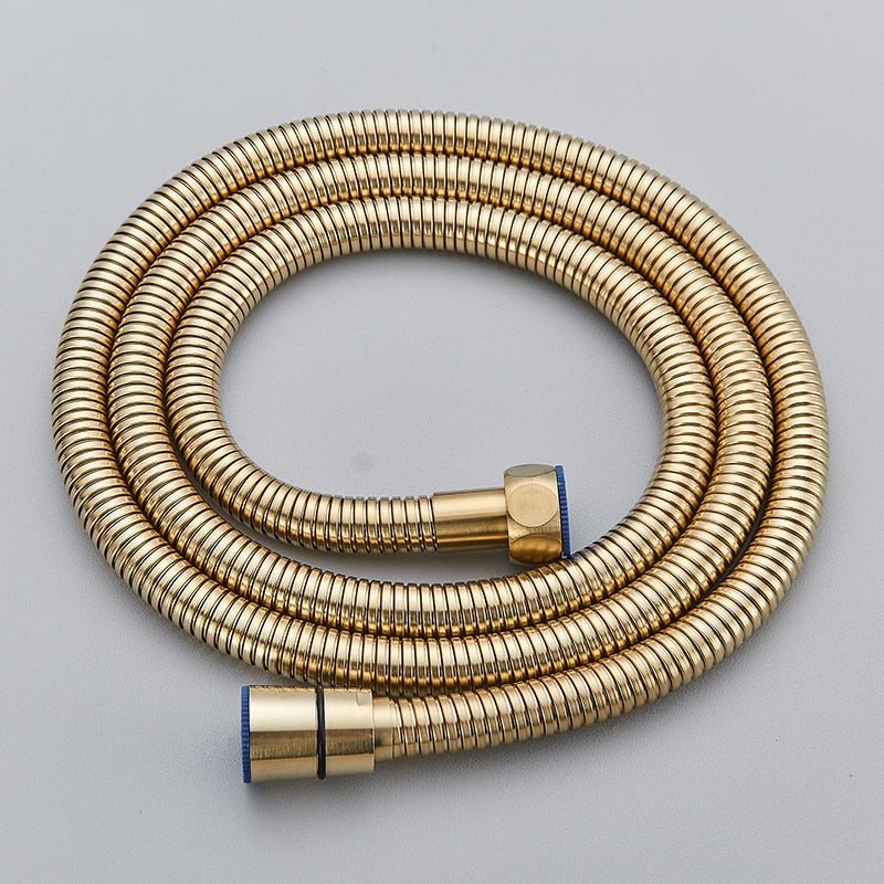 The Wall Mounted Brushed Gold Toilet Sprayer Bidet Faucet by Morsale.com, featuring a sleek minimalist design with a square nozzle head and flexible hose, seamlessly attaches to your wall. This modern sprayer perfectly complements contemporary bathroom faucets for a cohesive look.