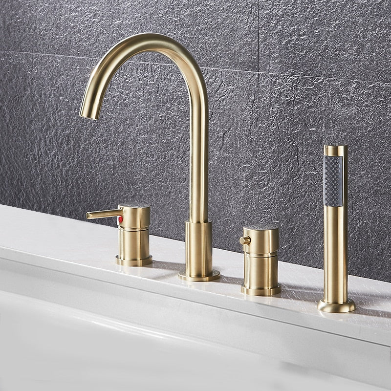 The Deck Mounted Bathroom Faucet Set with Handheld Shower by AllFixture is a modern fixture in a gold finish. It features a high arc spout, a lever handle, and a cylindrical control knob mounted on a white sink against a textured gray wall. This exquisite piece complements any bathroom faucet collection beautifully.