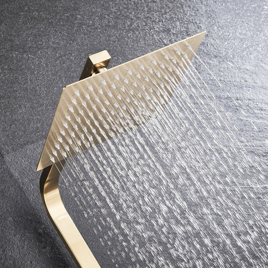 The AllFixture Windsor Complete Shower System features a modern square solid brass showerhead that sprays fine streams of water downward against a textured dark gray tiled wall.
