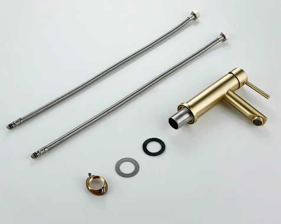 The Wasser™ Brushed Gold Solid Brass Bathroom Faucet by allfixture, featuring a sleek, modern design with a single lever handle, is positioned over a white sink with water flowing from the spout. In the background, a soap dish with a bar of soap adorns the countertop. This elegant faucet seamlessly complements other bathroom faucets and fixtures in your home.