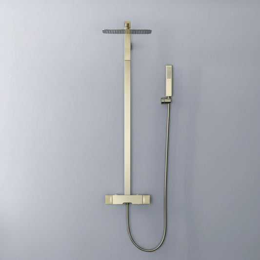 The Mike Jake Windsor Complete Shower System features a modern brushed gold finish with a square rainfall showerhead, slim handheld wand, and flexible hose, shown against a light gray background.