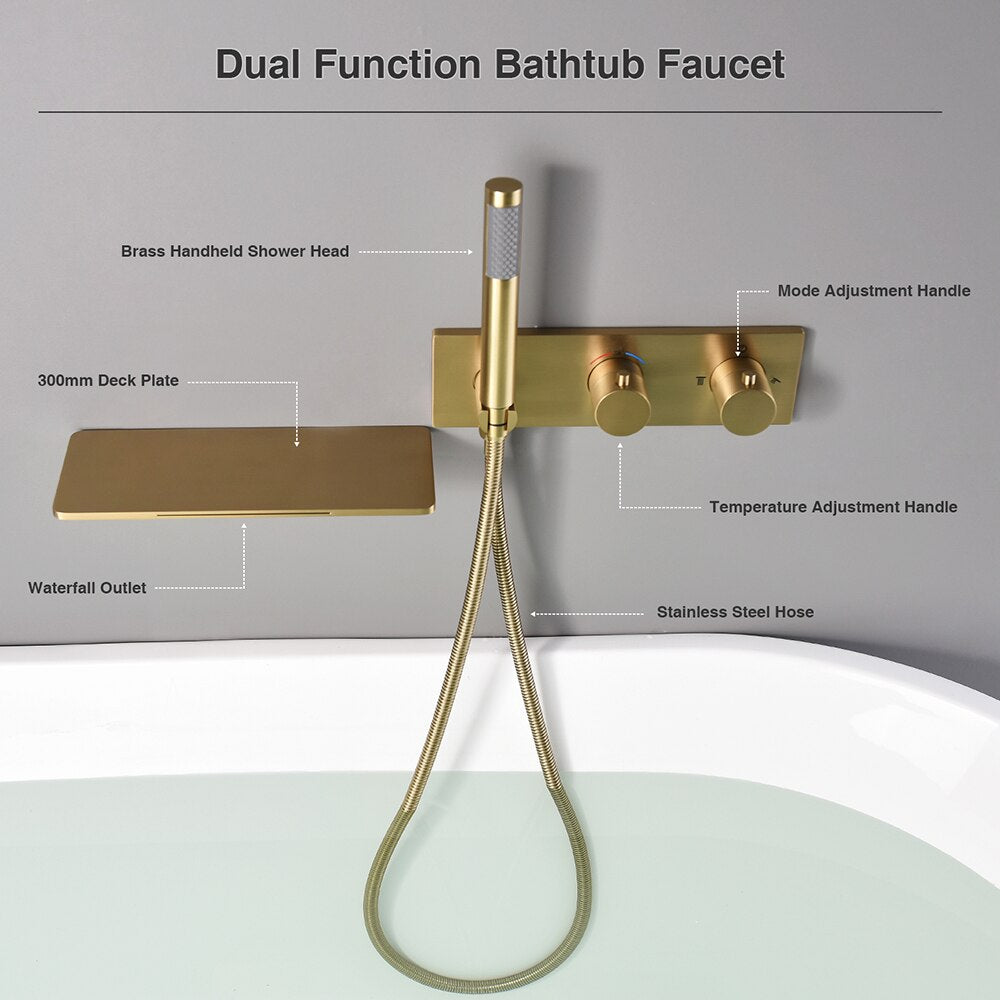 A Wasser™ Waterfall Bathroom Faucet with Handheld Shower Set by AllFixture, finished in modern gold, is mounted on a gray wall. The fixture includes an integrated shelf holding a few small bottles and features a control panel with two knobs, exemplifying the elegance of premium bathroom faucets. Below, a filled bathtub is visible.