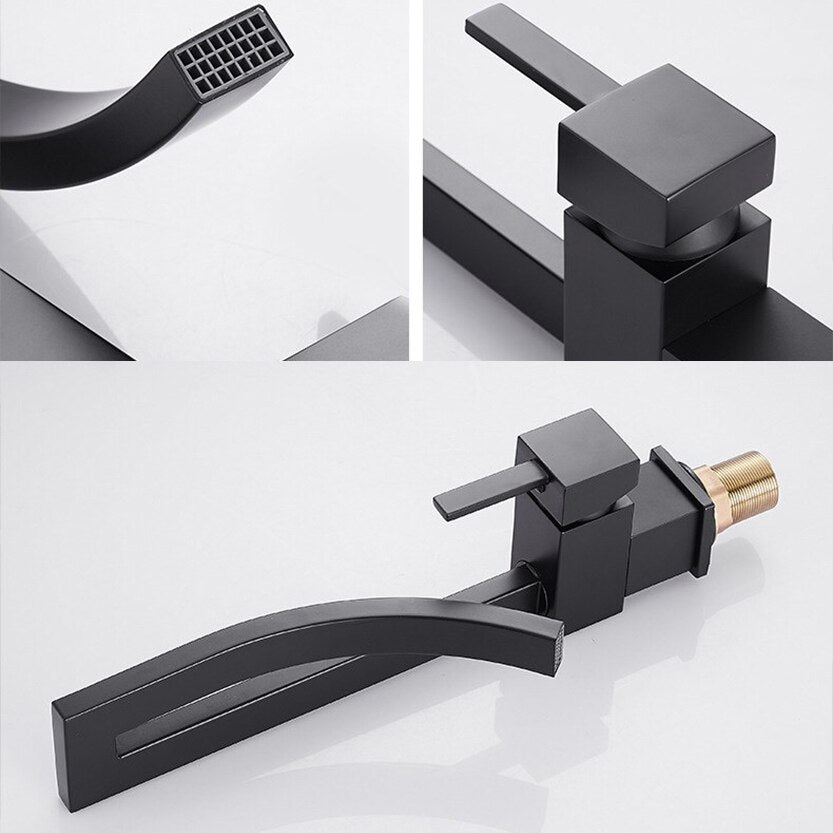 A modern, sleek Deck Mounted Brass Bathroom Basin Faucet from Bacala, featuring a curved design in black, is dispensing water into a white sink. In the background, there's a vase with dried flowers and a toothbrush holder containing a black and white toothbrush. The wall appears to be tiled in a dark color, echoing the elegance of a premium shower head.