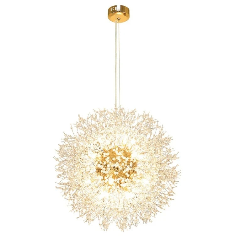Two ornate Morsale.com Crystal Dandelion Sphere Ceiling Lights hang above a dining table, casting a warm glow over a minimalist room with beige walls, modern art, and a vase of greenery.