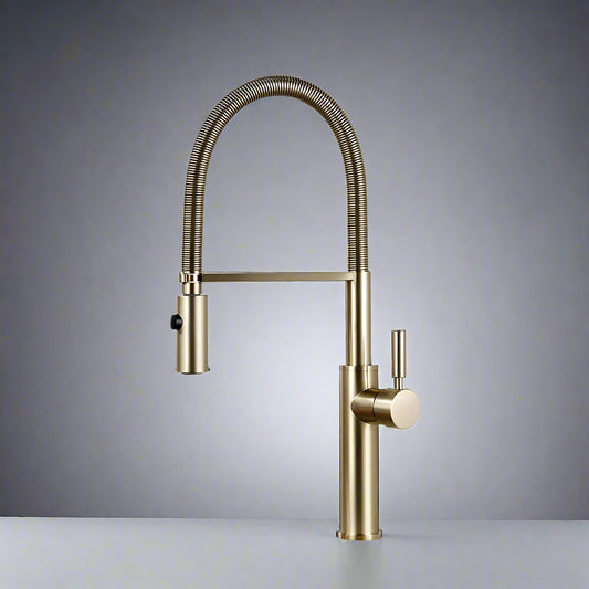 The Smesiteli Single Handle Pull Out Spout Kitchen Faucet, featuring a high flexible spring spout and contemporary brass design, is displayed against a plain gray background on a white surface.