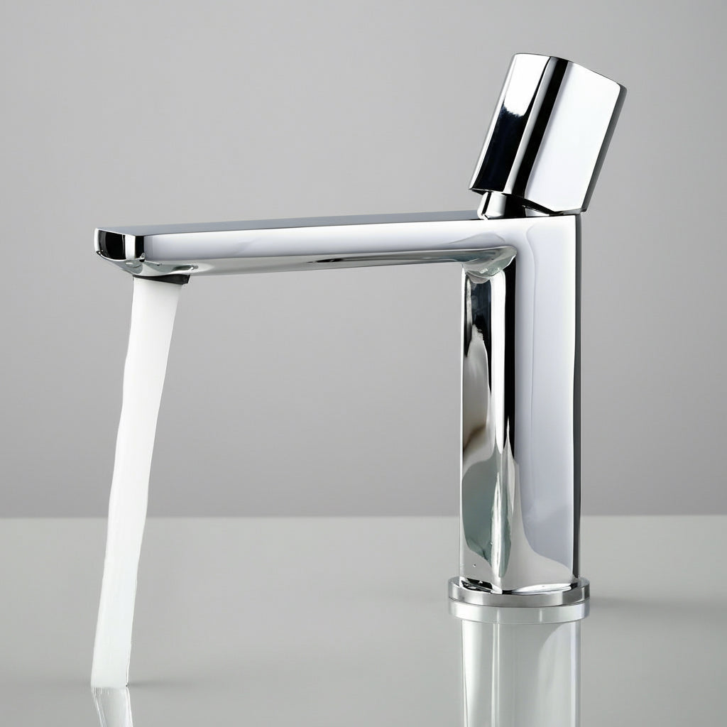 The AllFixture Valmont Bathroom Sink Faucet, featuring a sleek polished chrome finish, delivers a steady stream of water onto a reflective surface against a minimalist gray backdrop.