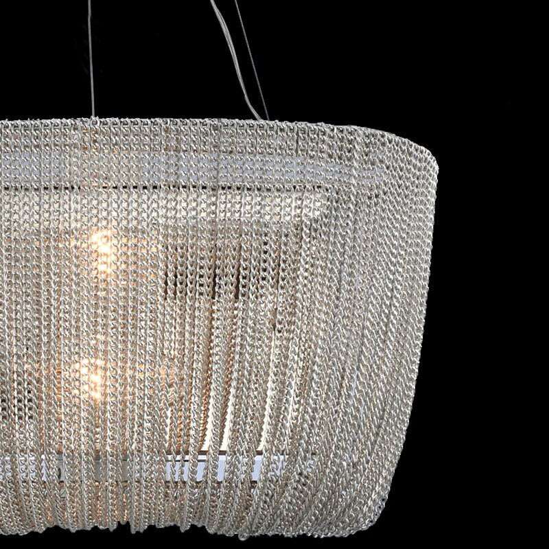 The Cadena Chain Tassel Chandelier Light by Morsale.com is a modern light fixture with a draped chain-link design, featuring two visible light bulbs inside. Reminiscent of a tassel chandelier, this rectangular pendant is elegantly suspended by two thin cables against a black background.