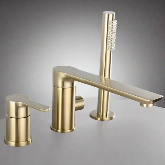 The Tiqui Solid Brass Shower Set With Bathtub Faucet features a modern brushed gold finish, single-handle lever, wide spout, and matching cylindrical handheld sprayer, all mounted on a smooth white surface.