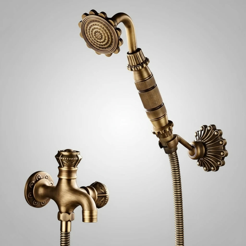 The AllFixture Heritage Wall-Mounted Bidet Faucet features vintage-style antique brass and ornate detailing, shown with a handheld showerhead against a plain light gray background.