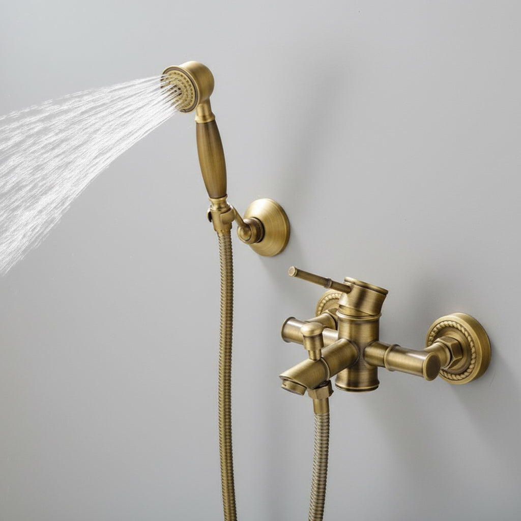 The AllFixture Heritage Shower & Tub Faucet System in antique brass, wall-mounted with a lever handle and handheld sprayer, is showcased against a light gray wall.