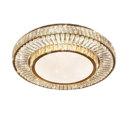 The Morsale Gio Crystal Ceiling Chandelier is a circular ceiling light with a golden frame and textured glass design. It features a dimmable frosted glass center, surrounded by intricate amber crystal-like details for an elegant and luxurious look.