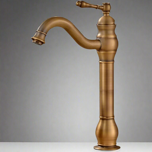 The Allfixture Deck Mounted Antique Brass Bathroom Faucet features a vintage-style curved spout and lever handle with a hot and cold water mixer, shown on a plain white surface against a gray background.