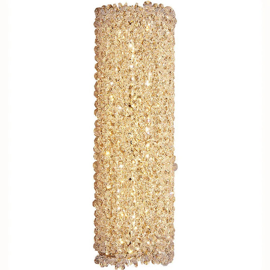 The Morsale Bergamo Crystal Sconce is an elegant, tall fixture with shimmering crystals that cast a warm amber glow. Resembling modern wall lighting, it features densely packed crystals for a luxurious and sparkling appearance that elevates any elegant home decor.