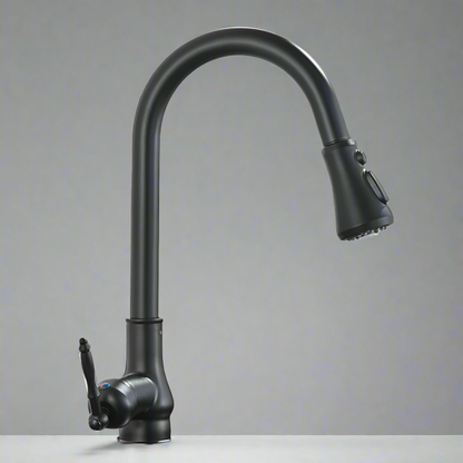The Rozin Matte Black Pull-Down Kitchen Faucet features a high curved spout and pull-down sprayer, deck mounted on a light countertop with a plain gray background.