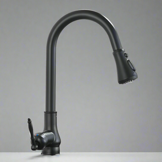 The Rozin Matte Black Pull-Down Kitchen Faucet features a high curved spout and pull-down sprayer, deck mounted on a light countertop with a plain gray background.
