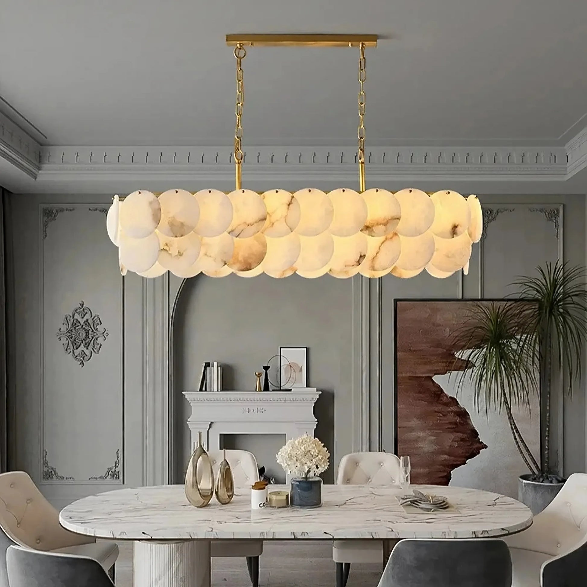 Moonshade Marble Dining Room Chandelier with Spanish marble and brass construction, illuminating a dining space with elegant, warm lighting.