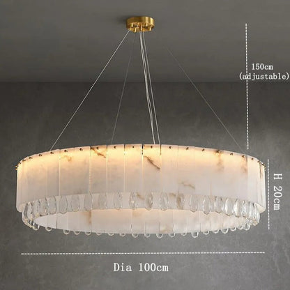 The Marble & Crystal Modern Chandelier by Morsale.com is a large, round luxury home decor piece with a 100 cm diameter and 20 cm height. It hangs elegantly from the ceiling using adjustable wires up to 150 cm. This sophisticated chandelier features a white shade adorned with crystal-like details along the bottom edge, exuding both elegance and modernity.