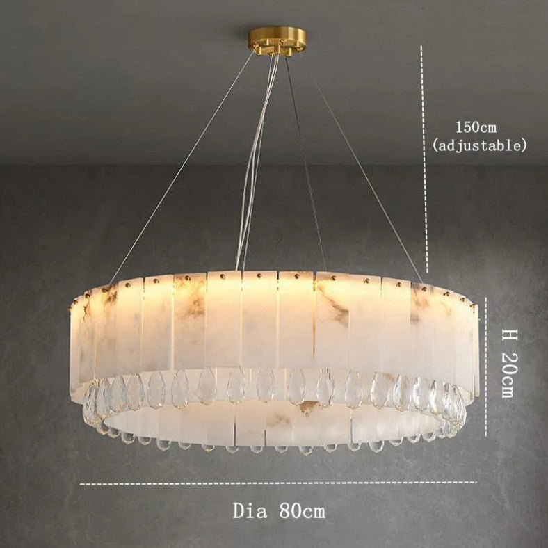 The Marble & Crystal Modern Chandelier by Morsale.com features an elegant design with an 80cm diameter and 20cm height. It comes with adjustable hanging wires extending up to 150cm. This luxurious chandelier showcases translucent, rectangular panels with a marble pattern and dazzling crystal-like elements, all enhanced by a sophisticated gold ceiling mount—ideal for adding a touch of luxury to your home decor.