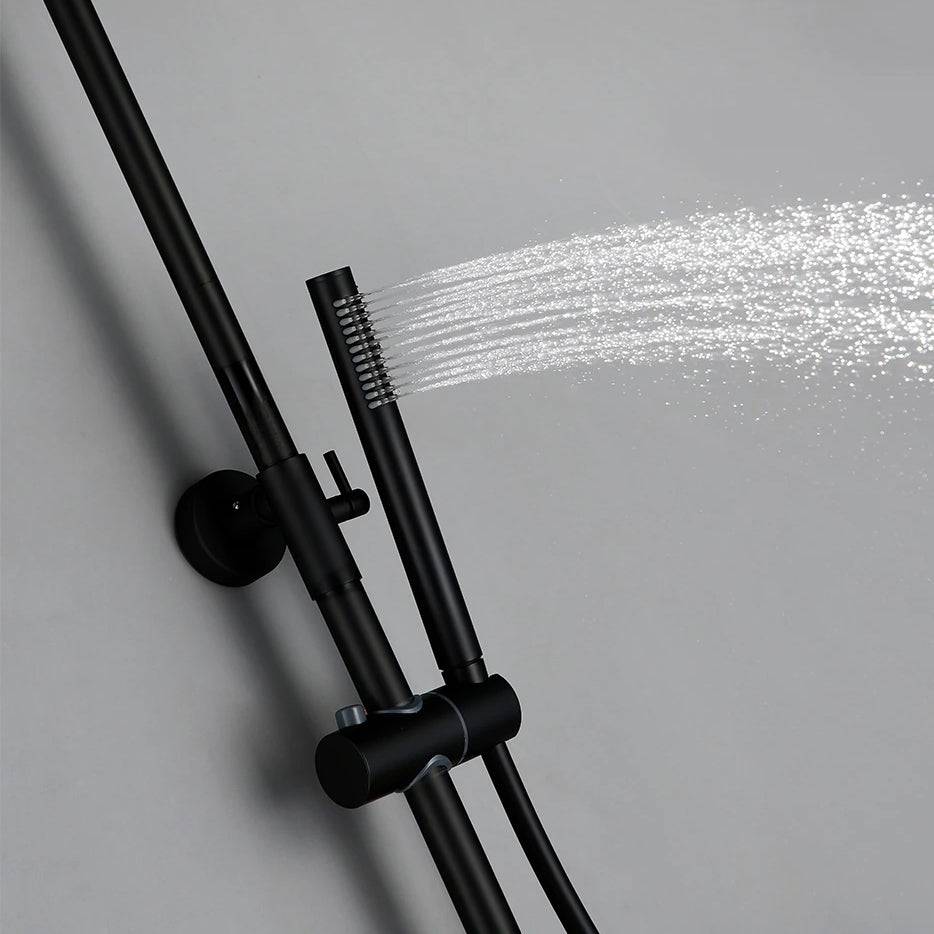 A sleek Water™ Matte Black Shower Faucet with a hand shower sprayer featuring multiple evenly spaced nozzle holes, mounted on a curved pipe, against a gray background from Morsale.com.