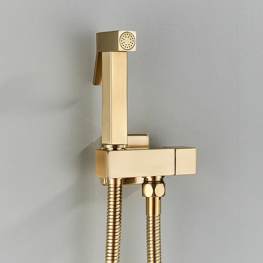 The Wall Mounted Brushed Gold Toilet Sprayer Bidet Faucet by Morsale.com, featuring a sleek minimalist design with a square nozzle head and flexible hose, seamlessly attaches to your wall. This modern sprayer perfectly complements contemporary bathroom faucets for a cohesive look.