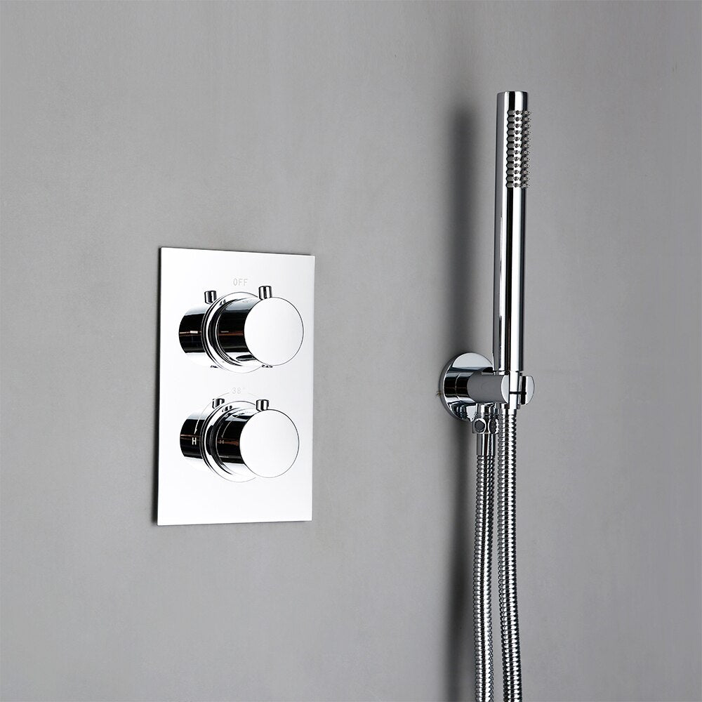 The Wasser™ Chrome Shower Faucet With Handheld Shower by AllFixture offers a sleek, modern shower setup. It features a round, chrome rain shower head mounted on the wall alongside an adjacent handheld shower head with a flexible hose. The sleek chrome panel below the fixed shower head is equipped with two control knobs and a temperature dial, ensuring precise control and seamlessly matching your bathroom faucets.