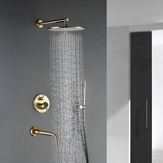 Experience a modern bathroom setup with the Wasser™ Complete Shower System With Bathtub Faucet by Morsale.com. This sophisticated system includes a round overhead shower faucet, handheld shower, single-lever mixer, and wall-mounted spout, all in a sleek gold finish. The water gracefully flows from the overhead shower head against a minimalist grey wall, epitomizing contemporary elegance.