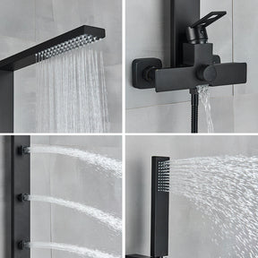 The tiled shower area features a Matte Black Wall Mounted Shower Panel With Massage Jets from Morsale.com. The panel boasts a rainfall showerhead, handheld shower wand, and three horizontal body jets, all emitting streams of water simultaneously. Complementing the sleek design are matching bathroom faucets and a white towel hanging on a nearby rack.