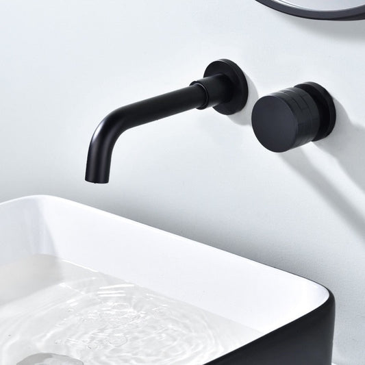 A sleek, modern bathroom sink is shown with the Aodei Wall Mounted Brass Matt Black Single Handle Bathtub Faucet. Water fills the white rectangular basin below. The design is minimalistic, highlighting the contemporary style of the plumbing fixture against a plain, light-colored wall.